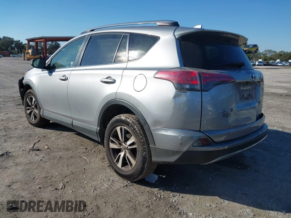 2018 Toyota RAV4 XLE with VIN JTMWFREV7JD125119, listed as a IAAI auction lot 41841021 with 132,659 mi miles and . Bid and sale history available at DreamBid. Image 3.