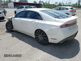 2017 Lincoln MKZ Select z VIN 3LN6L5C98HR607862, wystawiony jako IAAI lot #42072856 z przebiegiem 37 357 mil mil oraz . Historia ofert i sprzedaży dostępna na DreamBid. Obrazek 3.