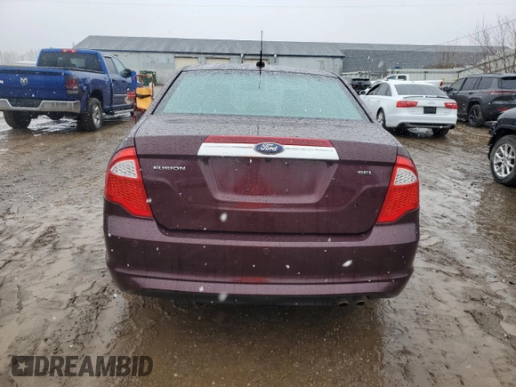 2012 Ford Fusion SEL z VIN 3FAHP0JA6CR431507, wystawiony jako Copart lot #49857795 z przebiegiem 133 680 mil mil oraz Czysty tytuł • Clean title. Historia ofert i sprzedaży dostępna na DreamBid. Obrazek 6.