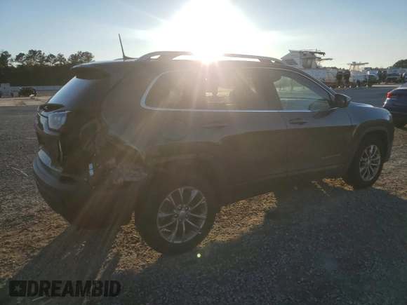 2020 Jeep Cherokee Lux with VIN 1C4PJLLX4LD648900, listed as a Copart auction lot 87129354 with 70,668 mi miles and Salvage title. Bid and sale history available at DreamBid. Image 3.