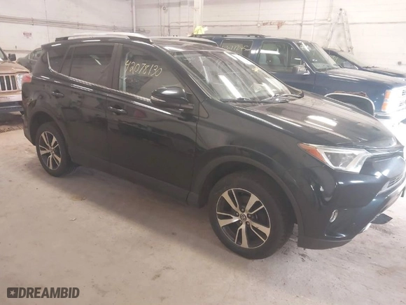 2017 Toyota RAV4 XLE with VIN JTMRFREV6HD208421, listed as a IAAI auction lot 42078130 with 228,365 mi miles. Bid and sale history available at carsss.com. Image 1.