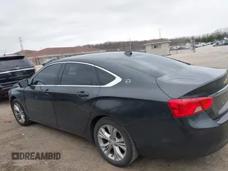 2014 Chevrolet Impala LT with VIN 1G1115SL1EU110327, listed as a IAAI auction lot 42136078 with 154,830 mi miles and . Bid and sale history available at DreamBid. Image 14.