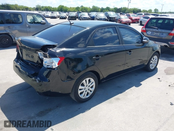 2010 Kia Forte EX with VIN KNAFU4A20A5847351, listed as a IAAI auction lot 41897921 with 129,084 mi miles. Bid and sale history available at carsss.com. Image 4.
