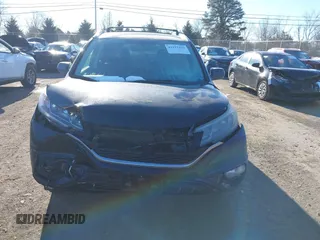 2015 Honda CR-V EX-L with VIN 2HKRM4H74FH682655, listed as a IAAI auction lot 41312452 with 161,587 mi miles. Bid and sale history available at carsss.com. Image 12.