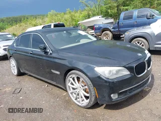 2011 BMW 7 Series 740Li with VIN WBAKB4C5XBC392890, listed as a IAAI auction lot 42108817 with 162,874 mi miles. Bid and sale history available at carsss.com. Image 1.