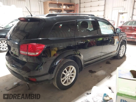 2016 Dodge Journey SXT with VIN 3C4PDCBG4GT206806, listed as a IAAI auction lot 41855100 with 169,554 mi miles. Bid and sale history available at carsss.com. Image 4.