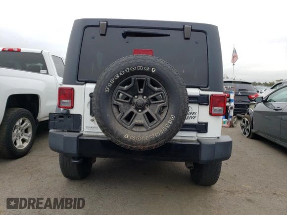 2018 Jeep Wrangler JK Unlimited Sport S with VIN 1C4BJWDG9JL825714, listed as a Copart auction lot 73287794 with 103,643 mi miles and Salvage Title. Bid and sale history available at carsss.com. Image 6.