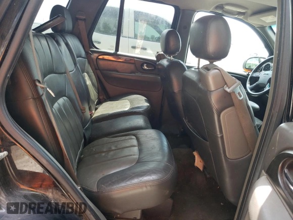 2004 GMC Envoy SLT with VIN 1GKDT13S042281050, listed as a Copart auction lot 60024304 with 267,205 mi miles and Salvage Title. Bid and sale history available at carsss.com. Image 11.