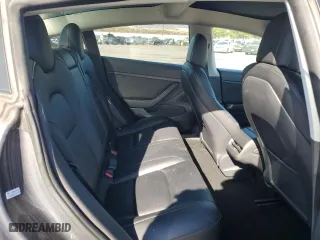 2021 Tesla Model 3 Standard Range Plus with VIN 5YJ3E1EA9MF872920, listed as a Copart auction lot 83625474 with 62,507 mi miles and Salvage Title. Bid and sale history available at carsss.com. Image 11.