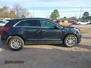 2019 Cadillac XT5 Luxury FWD z VIN 1GYKNCRSXKZ102866, wystawiony jako IAAI lot #41335840 z przebiegiem 59 563 mil mil oraz . Historia ofert i sprzedaży dostępna na DreamBid. Obrazek 13.