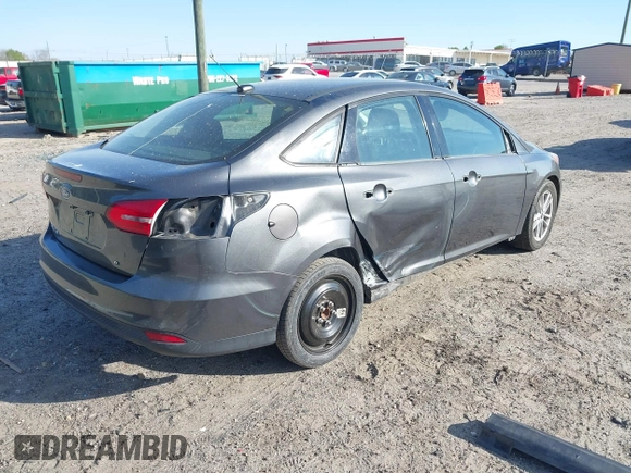 2018 Ford Focus SE with VIN 1FADP3F27JL294865, listed as a IAAI auction lot 41897496 with 100,048 mi miles and . Bid and sale history available at carsss.com. Image 4.