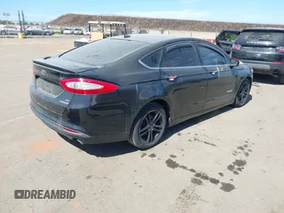 2016 Ford Fusion SE Hybrid z VIN 3FA6P0LU4GR260180, wystawiony jako IAAI lot #42508932 z przebiegiem 97 475 mil mil oraz . Historia ofert i sprzedaży dostępna na DreamBid. Obrazek 4.