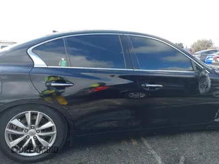 2014 Infiniti Q50 Premium with VIN JN1BV7AR2EM685587, listed as a IAAI auction lot 41777563 with 134,443 mi miles and . Bid and sale history available at DreamBid. Image 13.