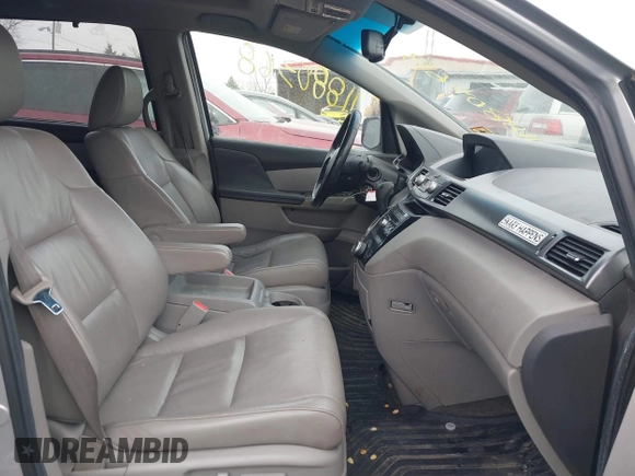 2013 Honda Odyssey EX-L with VIN 5FNRL5H63DB007682, listed as a IAAI auction lot 41408103 with 201,453 mi miles and . Bid and sale history available at carsss.com. Image 5.