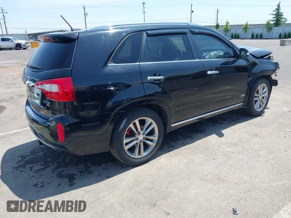 2014 Kia Sorento SX Limited with VIN 5XYKWDA71EG486958, listed as a IAAI auction lot 42483774 with 195,198 mi miles and . Bid and sale history available at DreamBid. Image 4.