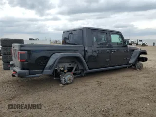 2023 Jeep Gladiator Rubicon with VIN 1C6JJTBG7PL573197, listed as a Copart auction lot 53866075 with 19,521 mi miles and Salvage title. Bid and sale history available at DreamBid. Image 3.