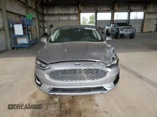 2020 Ford Fusion Titanium with VIN 3FA6P0RU5LR141507, listed as a Copart auction lot 64798205 with 113,216 mi miles and Salvage title. Bid and sale history available at DreamBid. Image 5.