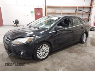 2014 Ford Focus Titanium with VIN 1FADP3J22EL199563, listed as a IAAI auction lot 41450106 with 129,271 mi miles. Bid and sale history available at carsss.com. Image 17.