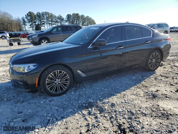 2017 BMW 5 Series 530i with VIN WBAJA5C30HWA34825, listed as a Copart auction lot 87022714 with 104,888 mi miles and Salvage Title. Bid and sale history available at carsss.com. Image 1.