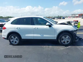 2014 Porsche Cayenne with VIN WP1AA2A20ELA02638, listed as a IAAI auction lot 42349570 with 113,355 mi miles and . Bid and sale history available at DreamBid. Image 13.
