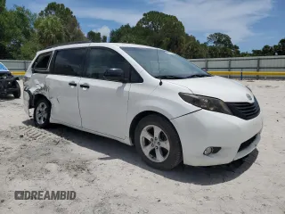 2014 Toyota Sienna L with VIN 5TDZK3DC3ES430634, listed as a Copart auction lot 60715375 with 122,621 mi miles and Salvage title. Bid and sale history available at DreamBid. Image 4.