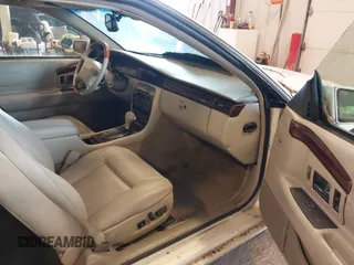 2001 Cadillac Eldorado Touring ETC z VIN 1G6ET12951B101641, wystawiony jako IAAI lot #42274235 z przebiegiem 119 965 mil mil oraz . Historia ofert i sprzedaży dostępna na DreamBid. Obrazek 5.