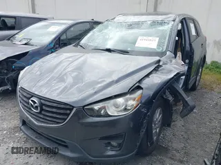 2016 Mazda CX-5 Touring with VIN JM3KE2CY6G0832967, listed as a IAAI auction lot 41943527 with 1 mi miles. Bid and sale history available at carsss.com. Image 2.