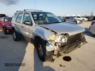 2005 Ford Escape XLS Value with VIN 1FMYU02Z75KB13387, listed as a Copart auction lot 40399594 with 148,579 mi miles and Salvage Title. Bid and sale history available at carsss.com. Image 1.