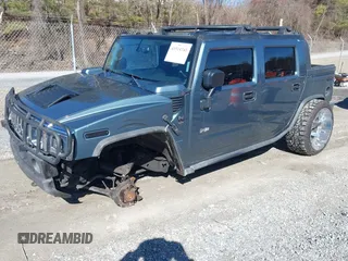 2005 Hummer H2 SUT with VIN 5GRGN22U85H107090, listed as a IAAI auction lot 41514241 with 202,119 mi miles. Bid and sale history available at carsss.com. Image 19.
