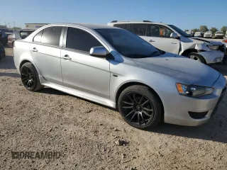 2014 Mitsubishi Lancer ES with VIN JA32U2FU8EU013693, listed as a Copart auction lot 77821024 with 130,306 mi miles and Salvage Title. Bid and sale history available at DreamBid. Image 4.