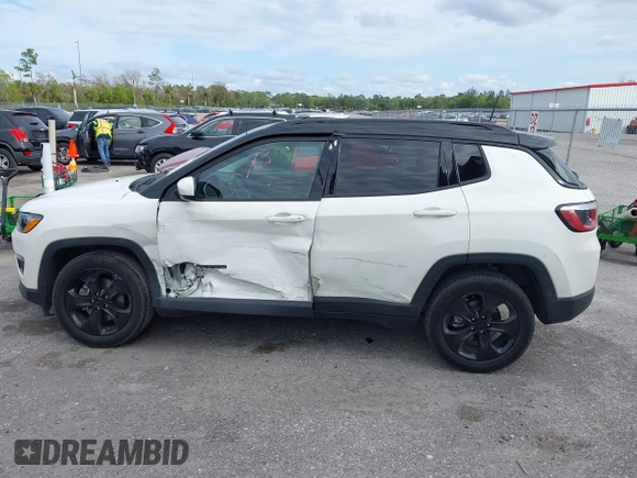 2018 Jeep Compass Latitude with VIN 3C4NJCBB1JT408465, listed as a IAAI auction lot 41350902 with 79,565 mi miles and . Bid and sale history available at DreamBid. Image 14.