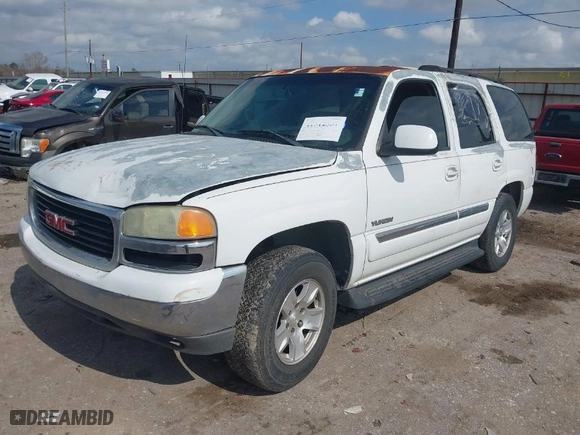2004 GMC Yukon SLT with VIN 1GKEC13V14J273866, listed as a IAAI auction lot 41512337 with 252,702 mi miles. Bid and sale history available at carsss.com. Image 2.