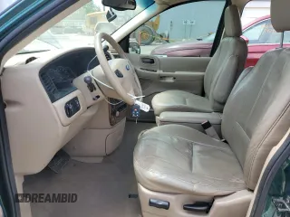 2003 Ford Windstar SEL z VIN 2FMDA53463BA29172, wystawiony jako Copart lot #56416405 z przebiegiem 124 800 mil mil oraz Szkody całkowita. Historia ofert i sprzedaży dostępna na DreamBid. Obrazek 7.