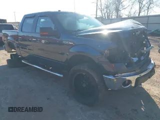 2014 Ford F-150 XL with VIN 1FTFW1EF3EKF69352, listed as a IAAI auction lot 41556907 with 216,535 mi miles. Bid and sale history available at carsss.com. Image 1.