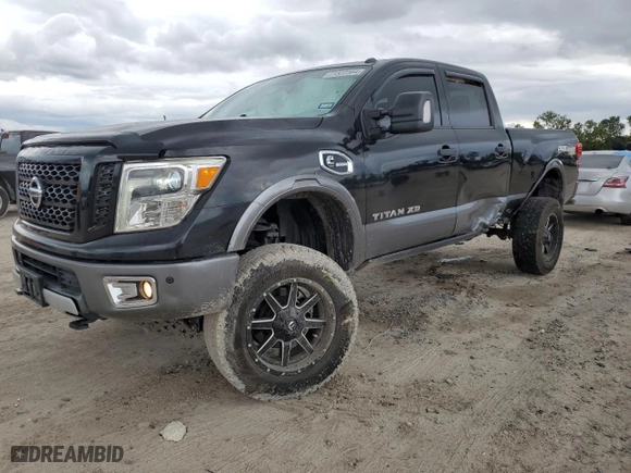 2017 Nissan Titan XD PRO-4X with VIN 1N6BA1F43HN555395, listed as a Copart auction lot 71322364 with 122,826 mi miles and Salvage Title. Bid and sale history available at carsss.com. Image 1.