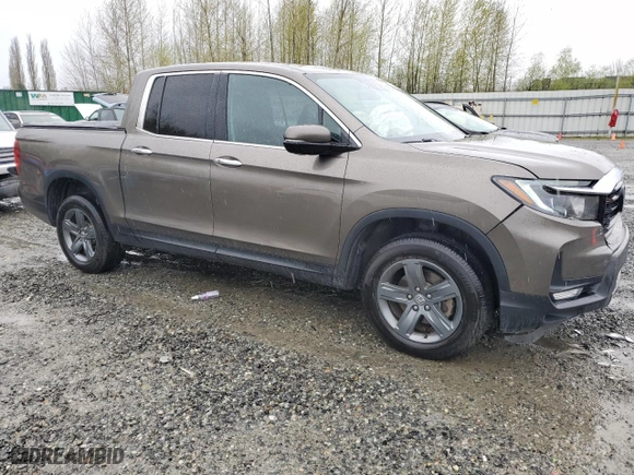 2021 Honda Ridgeline RTL-E with VIN 5FPYK3F78MB016027, listed as a Copart auction lot 52218845 with 67,428 mi miles and Salvage Title. Bid and sale history available at carsss.com. Image 4.