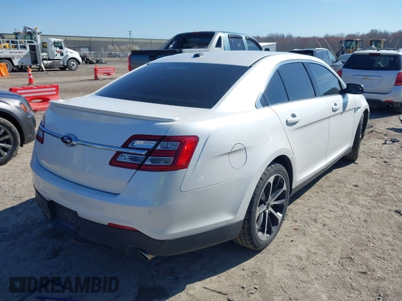2014 Ford Taurus SEL z VIN 1FAHP2E81EG104137, wystawiony jako IAAI lot #42054432 z przebiegiem 146 046 mil mil oraz . Historia ofert i sprzedaży dostępna na DreamBid. Obrazek 4.