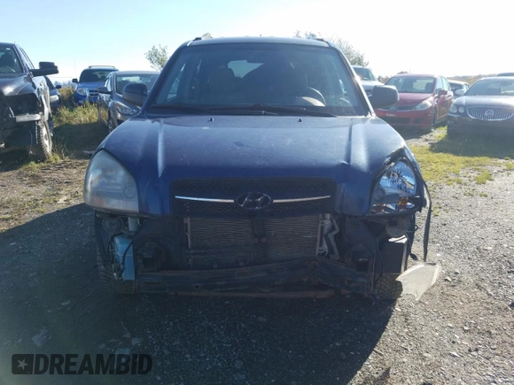 2006 Hyundai Tucson GL with VIN KM8JM72B76U405771, listed as a Copart auction lot 76751074 with 233,649 mi miles and Salvage Title. Bid and sale history available at carsss.com. Image 5.