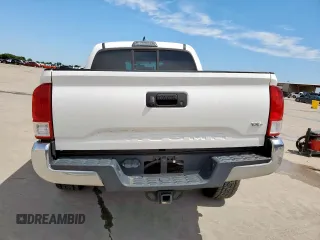 2017 Toyota Tacoma SR5 with VIN 3TMAZ5CN9HM052721, listed as a Copart auction lot 59791615 with 67,019 mi miles and Salvage title. Bid and sale history available at DreamBid. Image 6.