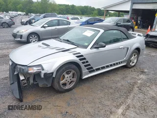 2002 Ford Mustang Deluxe z VIN 1FAFP44492F221578, wystawiony jako IAAI lot #42242232 z przebiegiem 107 773 mil mil oraz . Historia ofert i sprzedaży dostępna na DreamBid. Obrazek 2.