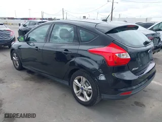 2014 Ford Focus SE with VIN 1FADP3K27EL199542, listed as a IAAI auction lot 42071908 with 142,180 mi miles. Bid and sale history available at carsss.com. Image 3.
