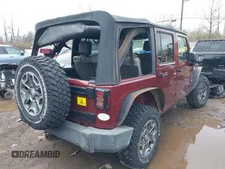 2007 Jeep Wrangler Unlimited Sahara with VIN 1J4GA59177L162022, listed as a IAAI auction lot 41887599 with 207,358 mi miles and . Bid and sale history available at DreamBid. Image 4.