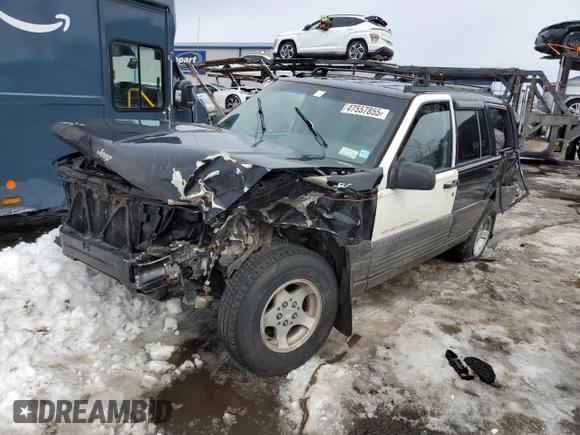 1998 Jeep Grand Cherokee Laredo with VIN 1J4GZ58SXWC293835, listed as a Copart auction lot 47557855 with 217,948 mi miles and Salvage Title. Bid and sale history available at carsss.com. Image 1.