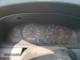2001 Nissan Frontier XE z VIN 1N6DD21S41C395492, wystawiony jako Copart lot #59430105 z przebiegiem 108 576 mil mil oraz Tytuł czysty. Historia ofert i sprzedaży dostępna na DreamBid. Obrazek 9.