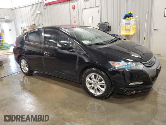 2010 Honda Insight EX z VIN JHMZE2H72AS009647, wystawiony jako Copart lot #60079205 z przebiegiem 157 844 mil mil oraz Czysty tytuł • Clean title. Historia ofert i sprzedaży dostępna na DreamBid. Obrazek 4.