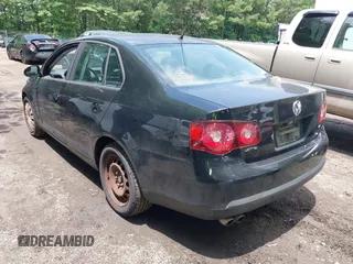 2009 Volkswagen Jetta S with VIN 3VWJZ71K19M053025, listed as a IAAI auction lot 42468951 with 225,036 mi miles and . Bid and sale history available at DreamBid. Image 3.