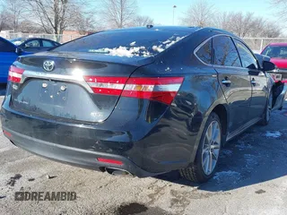 2014 Toyota Avalon Limited with VIN 4T1BK1EB7EU123048, listed as a IAAI auction lot 41246530 with 113,978 mi miles and . Bid and sale history available at DreamBid. Image 4.