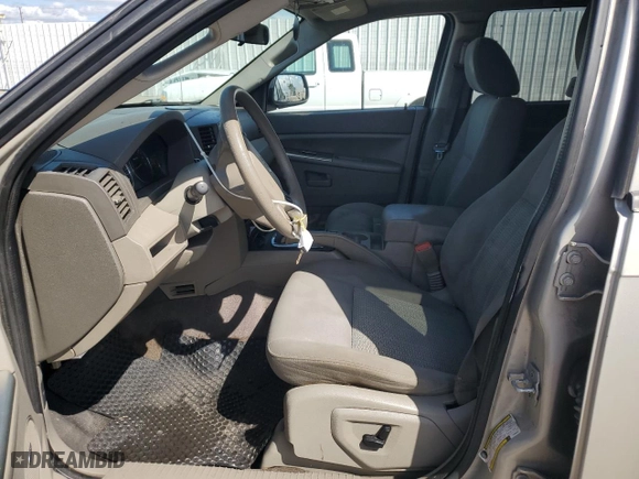 2007 Jeep Grand Cherokee Laredo with VIN 1J8GS48K07C699301, listed as a Copart auction lot 51000705 with 104,256 mi miles and Clean Title. Bid and sale history available at carsss.com. Image 7.