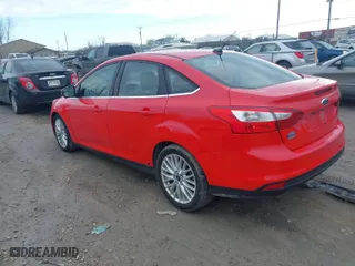 2012 Ford Focus SEL with VIN 1FAHP3H22CL332679, listed as a IAAI auction lot 41880964 with 149,031 mi miles. Bid and sale history available at carsss.com. Image 3.
