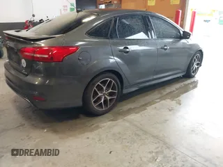 2015 Ford Focus SE with VIN 1FADP3F26FL279667, listed as a IAAI auction lot 42422726 with 102,426 mi miles and . Bid and sale history available at DreamBid. Image 4.